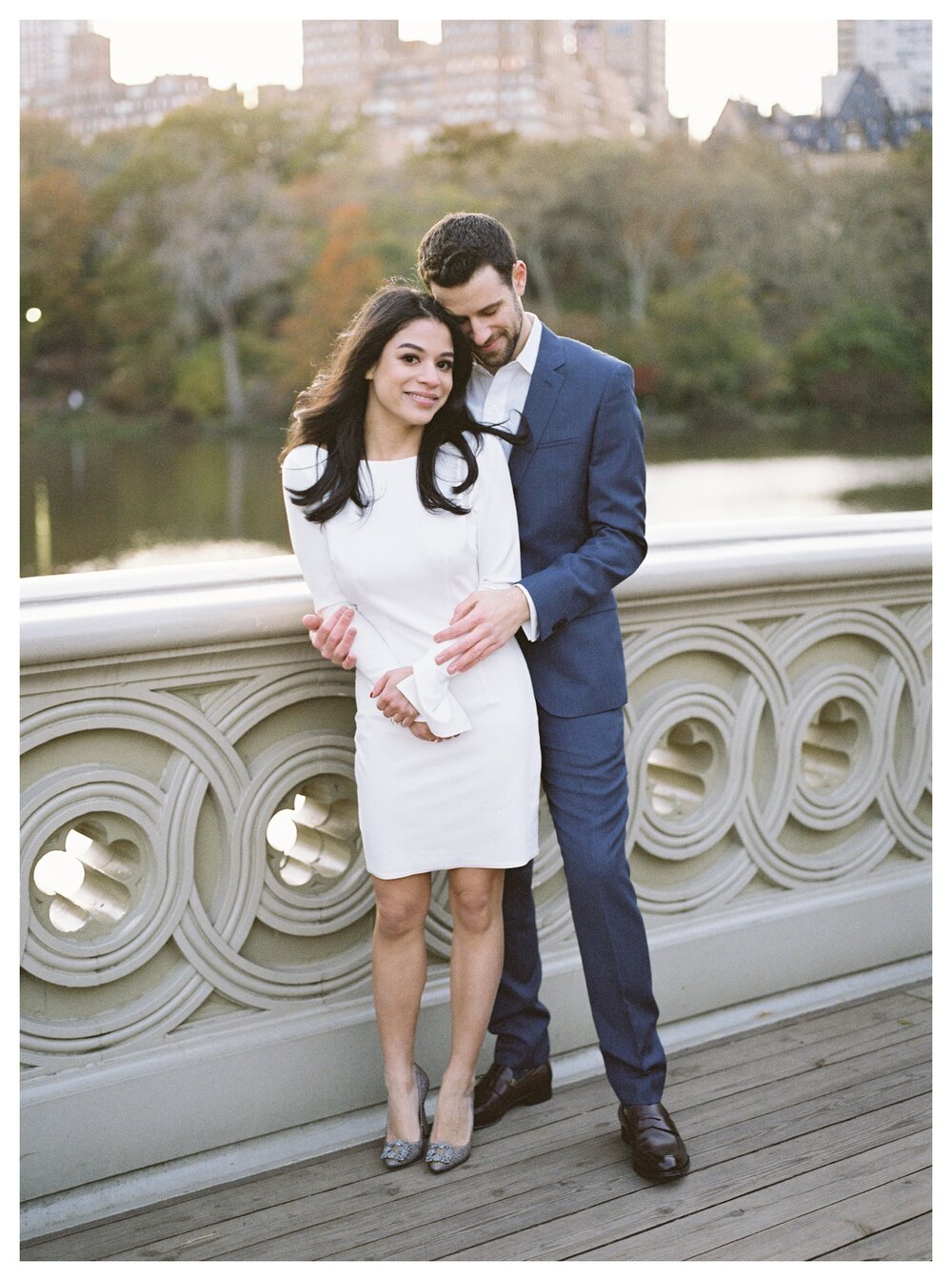  engagement photos in central park on bow bridge 