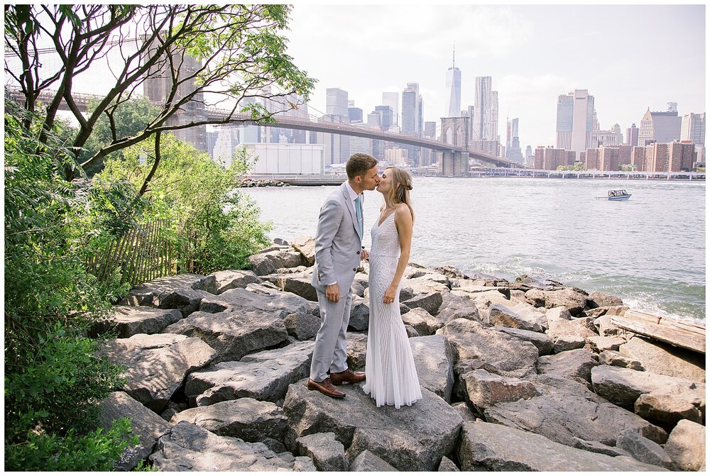  dumbo brooklyn wedding photos, new york city skyline wedding photos, brooklyn wedding, dumbo brooklyn elopement, bride and groom kissing in new york city 